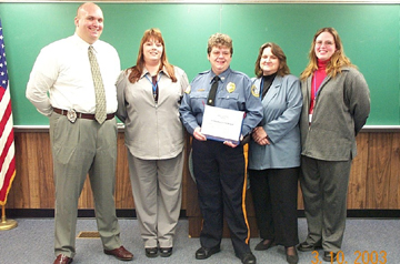 Members of the Justice Facility's Classification Unit are acknowledged at March 10 ceremony.